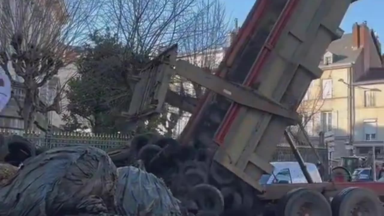 Farmers dump manure and tyres outside council buildings in Limoges France