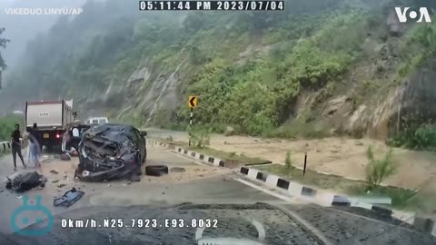 Giant Rock Hits Vehicles on Road in India