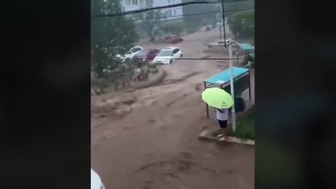 Unbelievable Footage of Record-Breaking Flash Flood Caught on Camera