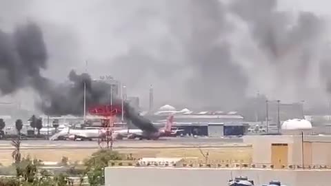 Several planes at Khartoum airport are on fire.