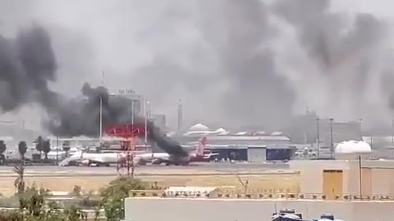 Several planes at Khartoum airport are on fire.