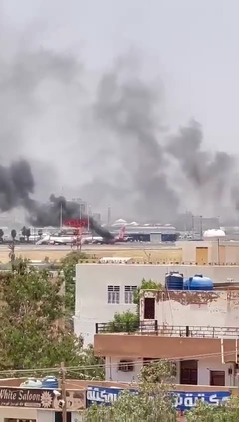 Several planes at Khartoum airport are on fire.