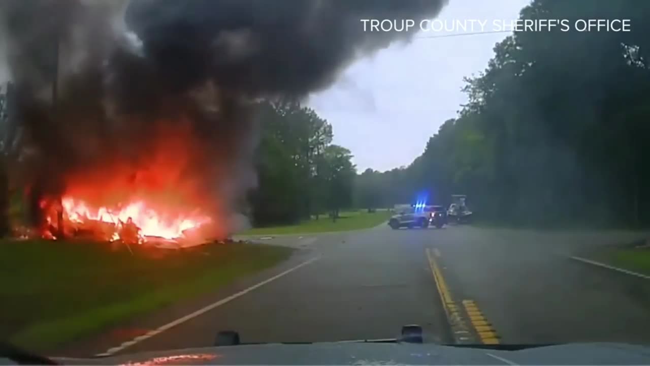 Dashcam Footage Shows Deputies Save People From Car Fire