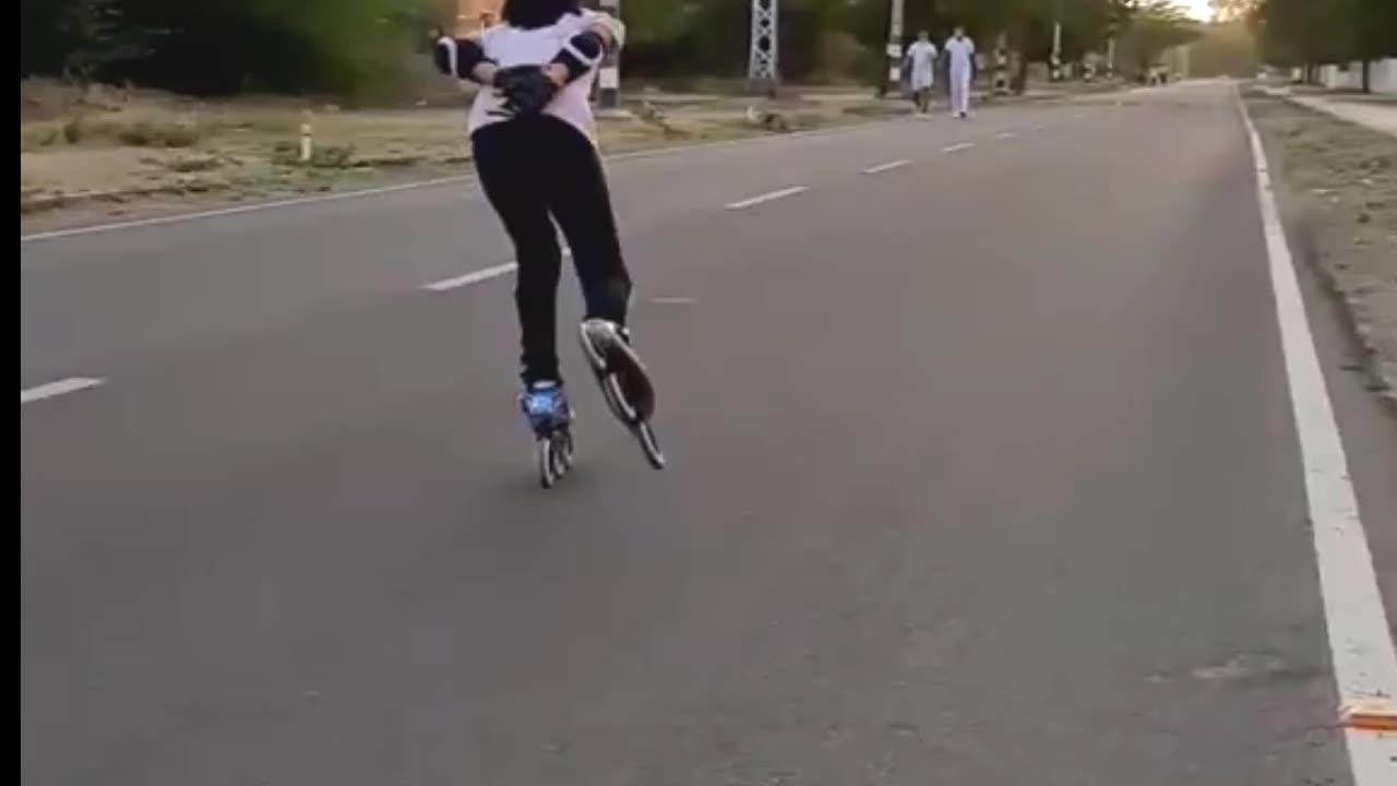 A little girl palying on the road