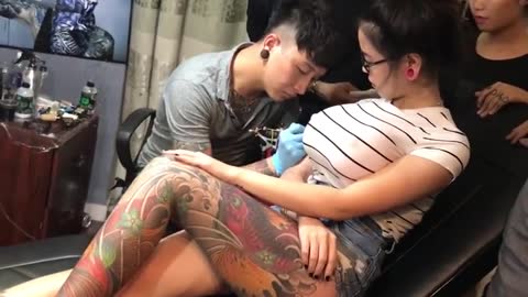 HER BOOB POPS WHILE GETTING A TATTOO!!!