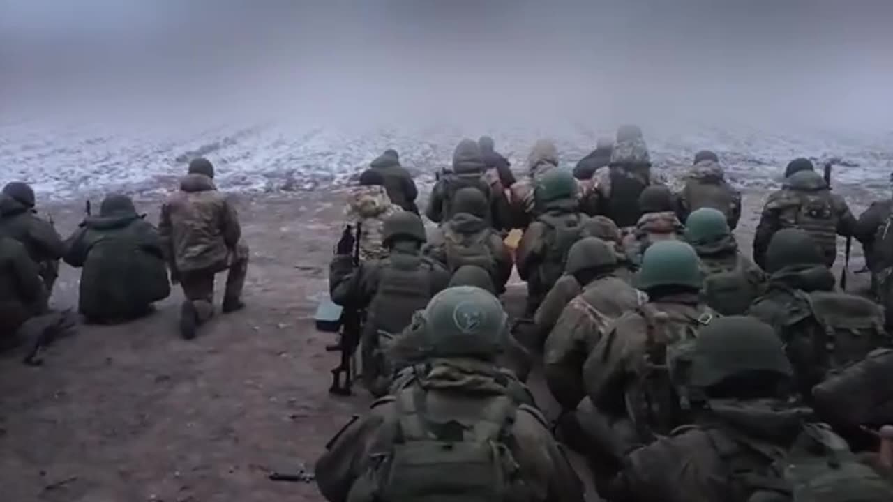 Russian soldiers praying 🙏 before heading into battle.