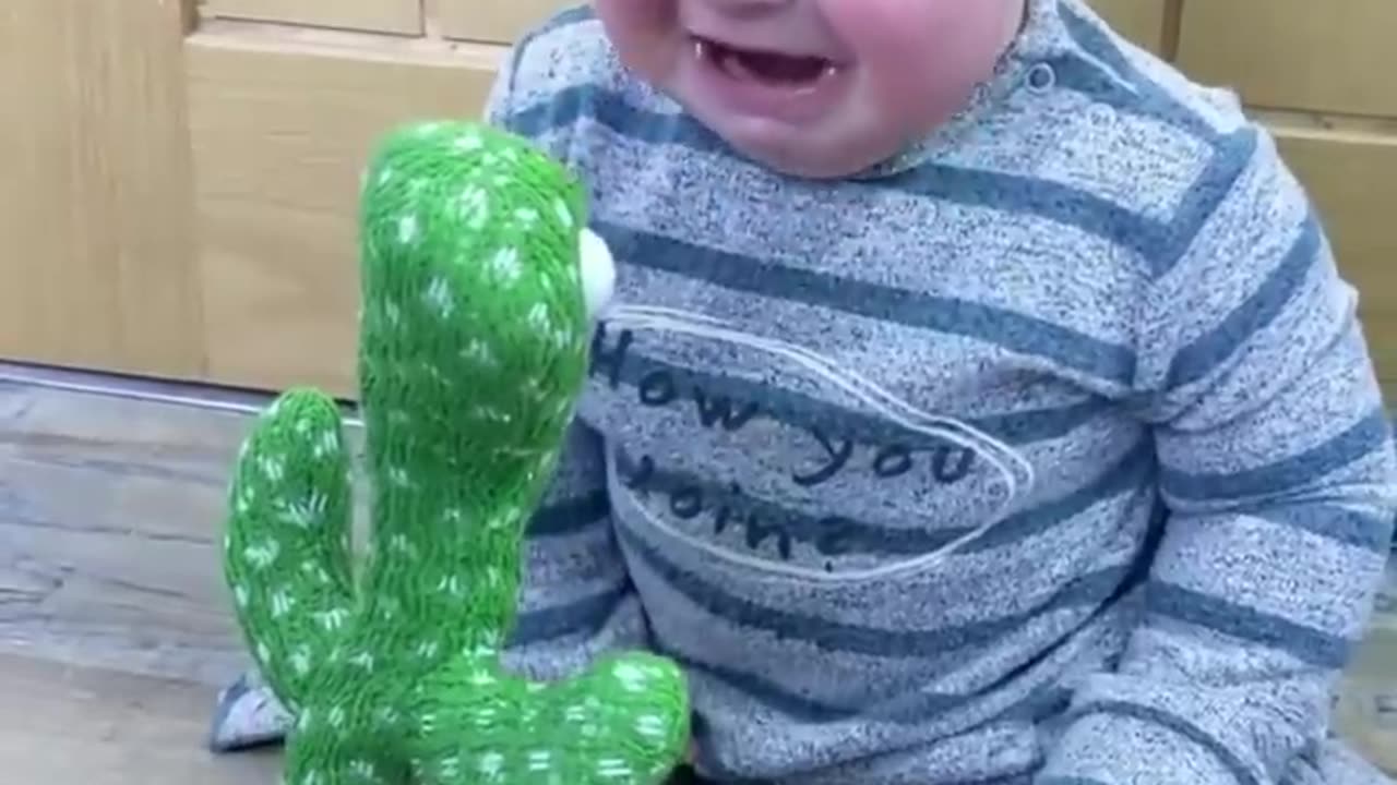 Cute Babies Playing with Dancing Cactus