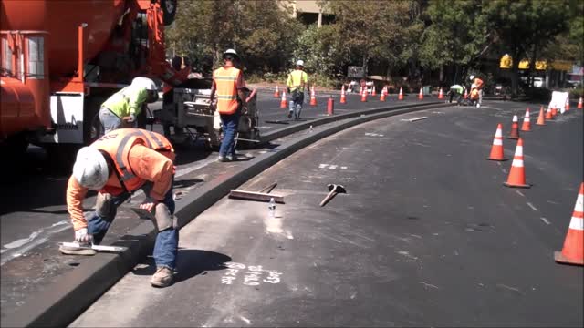 Concrete Curb Extrusion on Existing Asphalt Street Surface