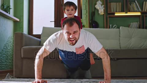 A funny little boy with his dad