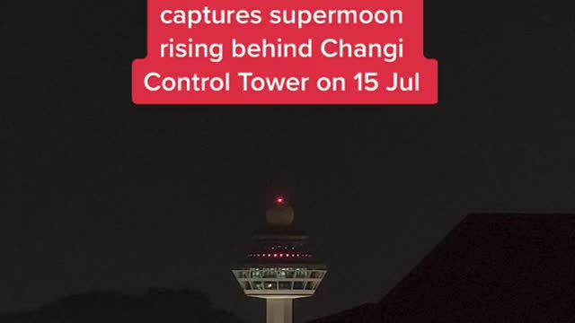 S'pore photographer captures supermoon rising behind Changi Control Tower on 15 Jul