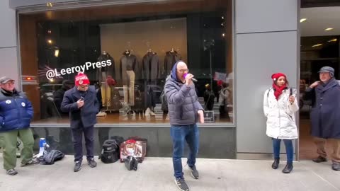 Protesters gather in front of the World Economic Forum in New York City