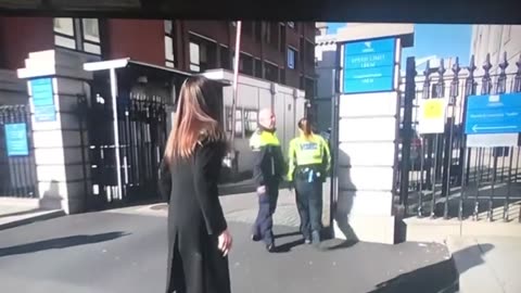 Enoch's sister wasn't spared either, thrown to the floor by the Garda.