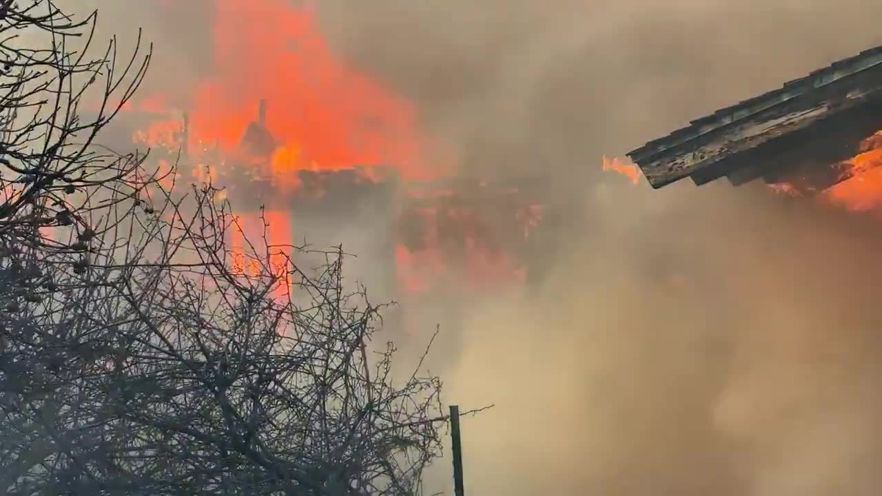 Homes burning on Avocado Place in Spanish Hills in the Mountain Fire