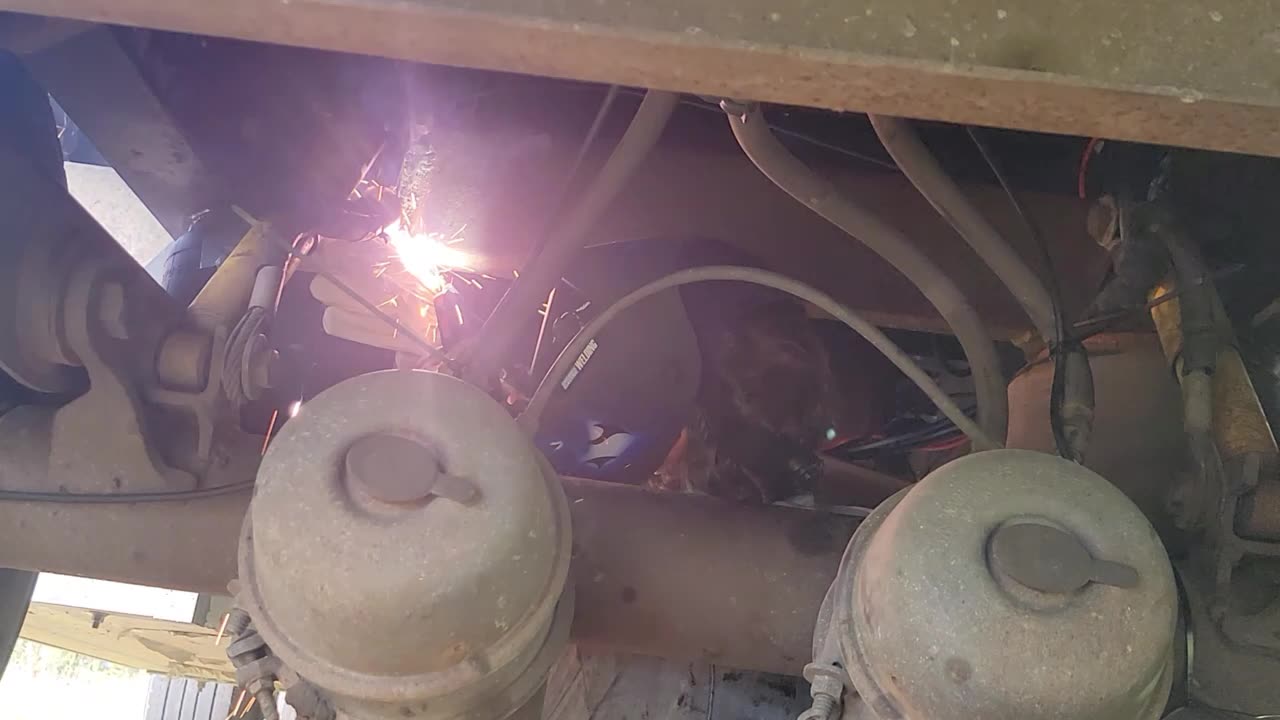 WELDING UNDERNEATH THE FLATBED TRAILER