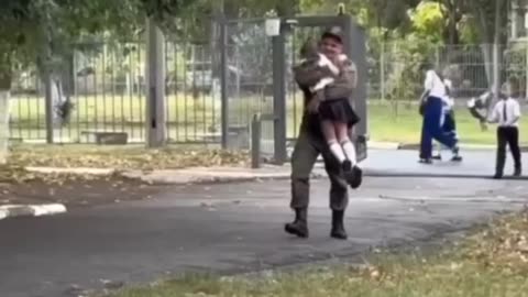 The grandfather came from the front to see his granddaughter off to first grade