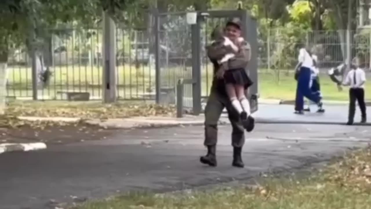 The grandfather came from the front to see his granddaughter off to first grade