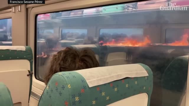 Spain wildfires: Train passengers stunned after flames spotted out either window