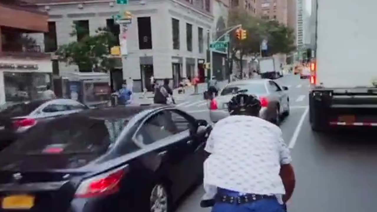 Dude bikes through traffic and finds out