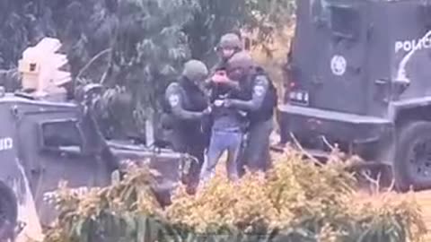 Israeli forces harass and detain a young Palestinian in the town of Beita