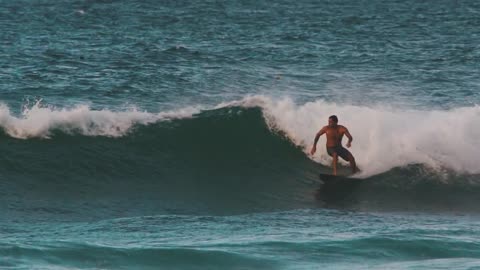 A Man Surfing