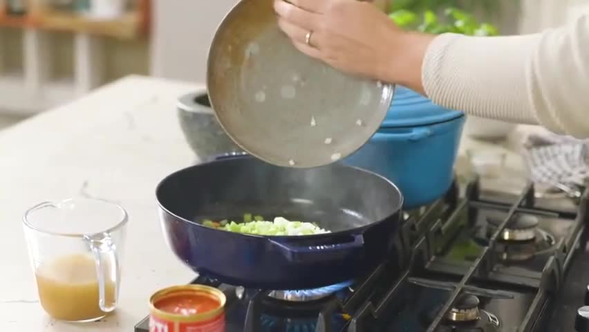 After tomato, onion, spring onion boil water in another pot,