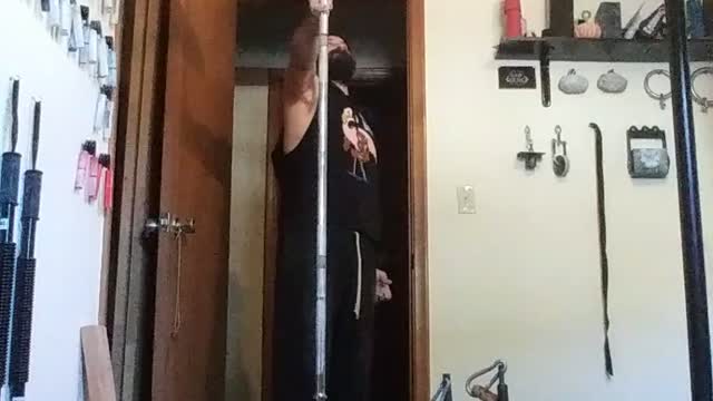 Pinky straight arm barbell raise