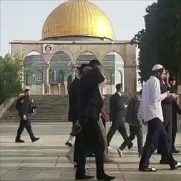 All heading to worship under the temple mound