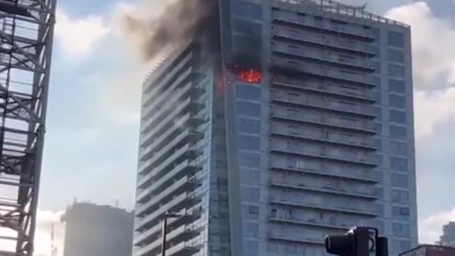 London luxury high rise building on fire.