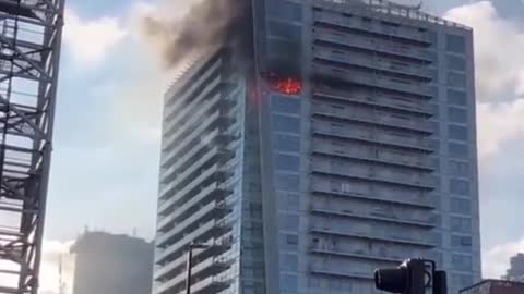 London luxury high rise building on fire.