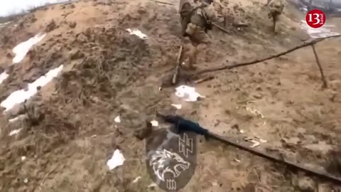 Ukrainian fighters disembarking an armored vehicle, clear a stronghold from Russians -Combat footage