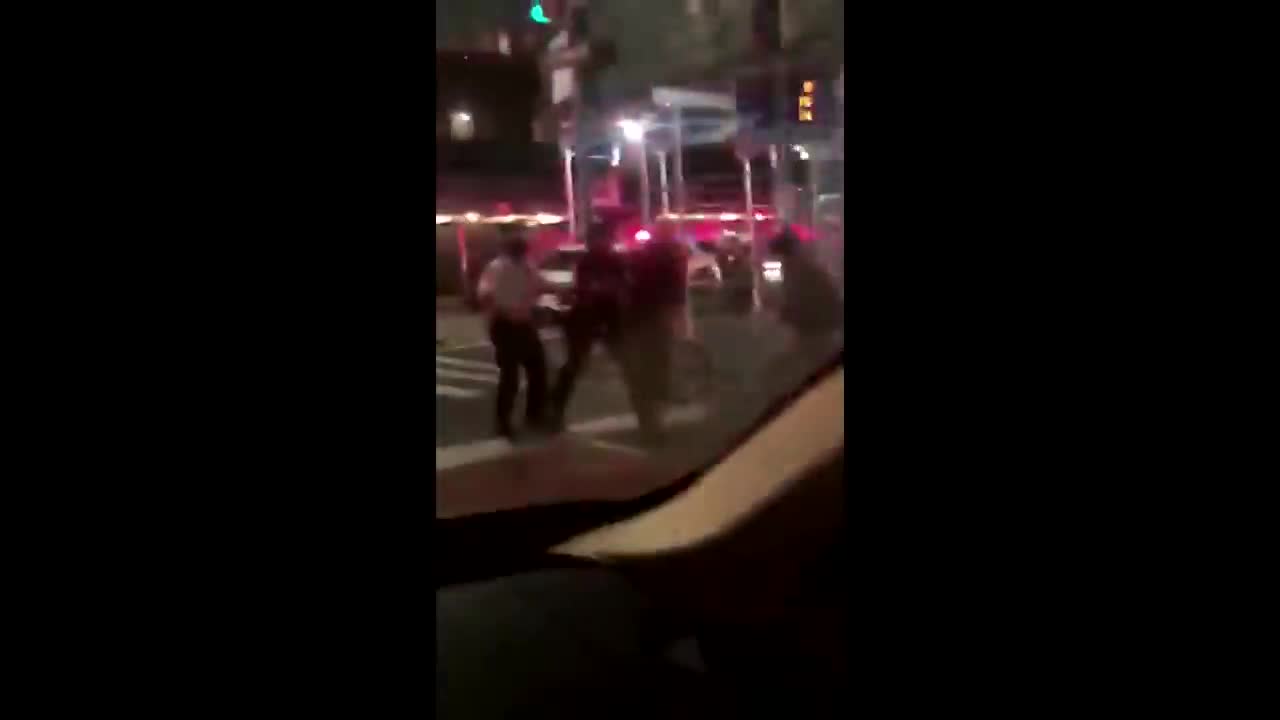 NY Police officers filmed hitting cyclist after a citywide curfew took effect