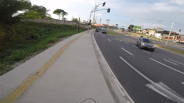 riding an 80 cc motorized bicycle.