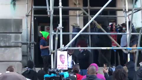 Cameraman pushed down stairs and abused.