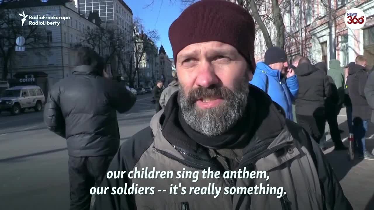 Russian invasion - Ukrainians & foreign men line up for weapons to defend Kyiv