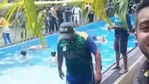 Sri Lankan protestors swimming in president's pool