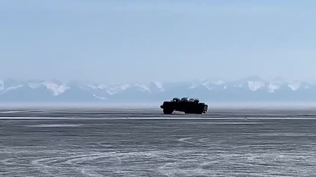 Truck Carrying Construction Materials Falls Through Ice