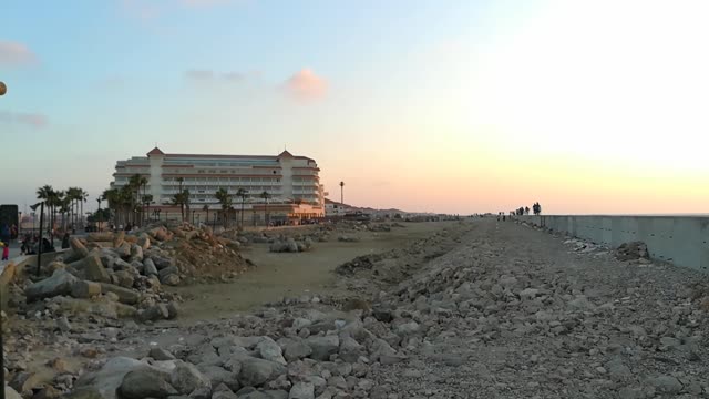 Couples Walk In Romantic Beach Sunset View