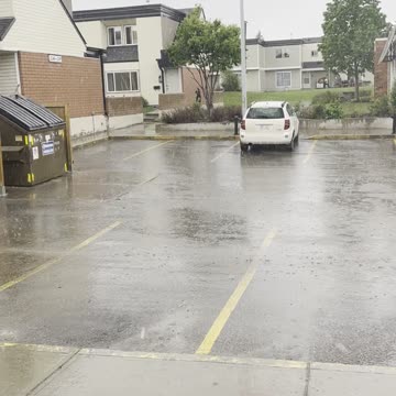 Heavy rain in front of the house