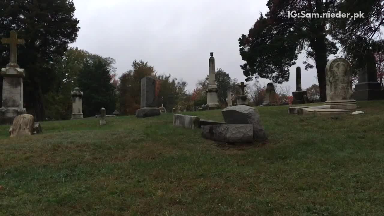 Kid in green shirt tries to do front flip and falls