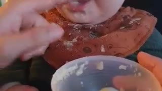 Baby eats in Unconventional way