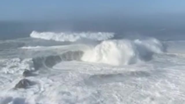 Record breaking waves surfed at Nazare, Portugal