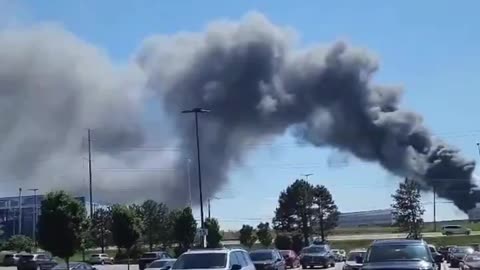 Firefighters are battling a massive fire that reportedly broke out at a warehouse