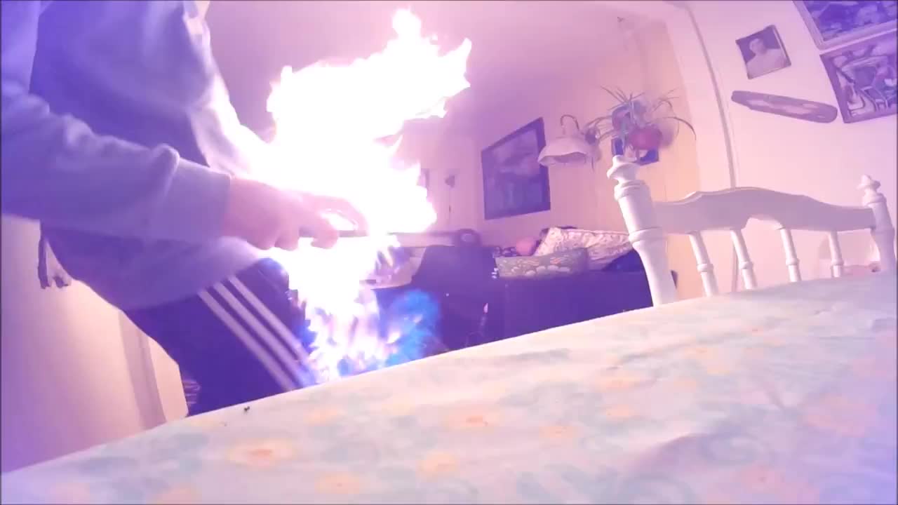 Guy green table lights long lighter and living room on fire screams