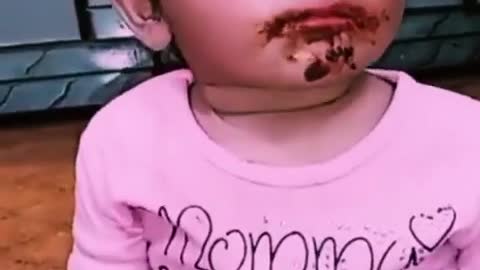 Baby chocolate eating