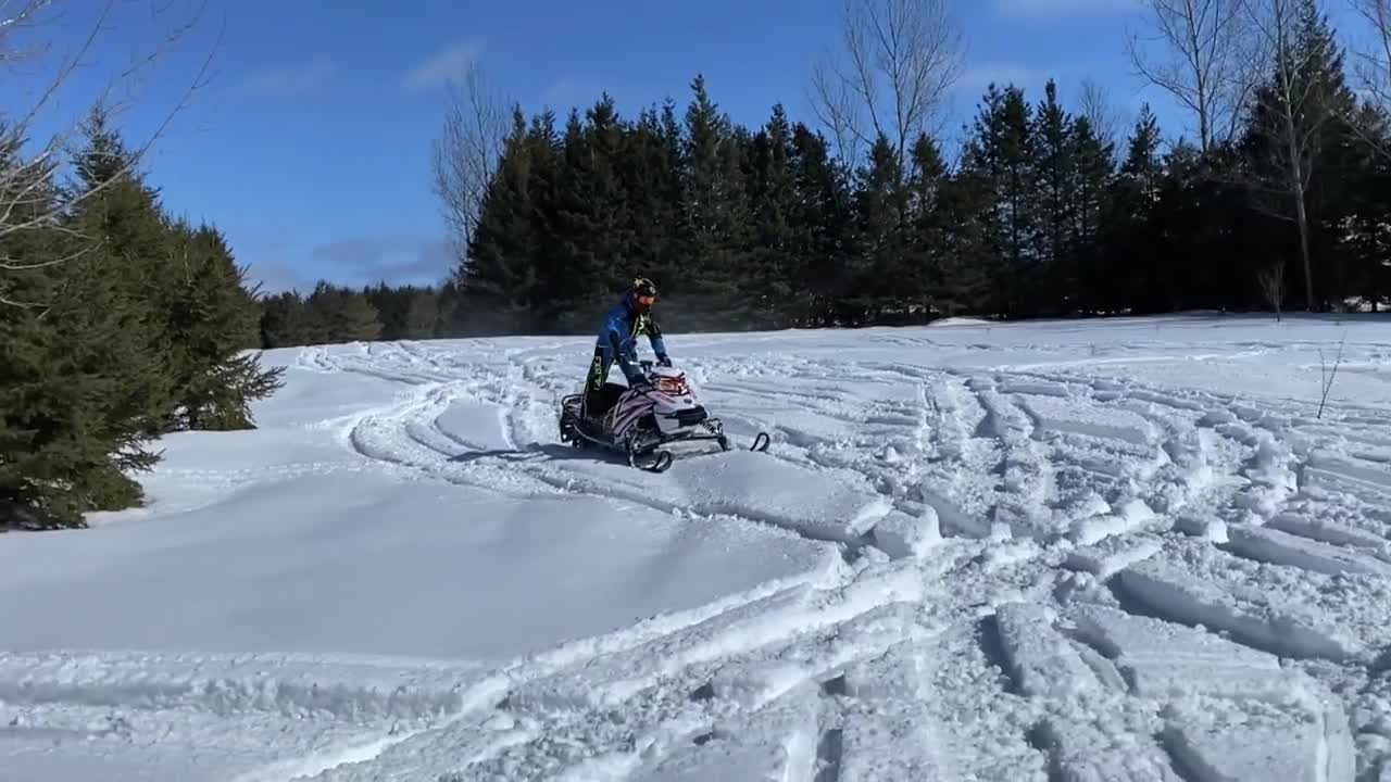 How To WHEELIE A SNOWMOBILE!