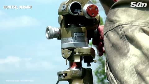 Ukrainian soldiers fire a flurry of rockets at Russian targets in Donetsk
