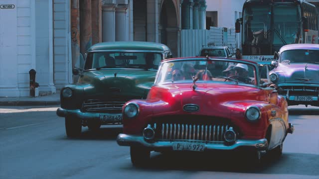 Footage Of A Vintage Cars In The Street.