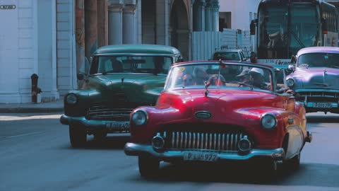 Footage Of A Vintage Cars In The Street.