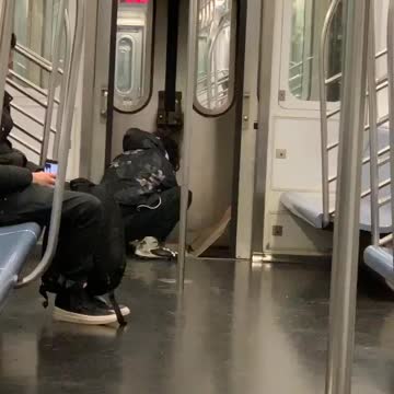 Man fire between two trains