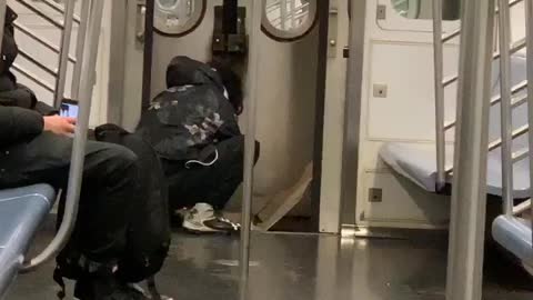 Man fire between two trains